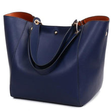 Load image into Gallery viewer, This beautiful large large capacity blue leather tote bag is perfect for everyday use. Closure Type: Hasp. Hardness: Soft. Lining Material: Synthetic Leather. Number of Handles/Straps: Two. Interior: Interior Compartment, Zipper Pocket, Slot Pocket, Cell Phone Pocket. Size: 11.81 x 1.97 x 7.87 inches (0cm x 5cm x 20cm). Free shipping.