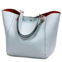 Load image into Gallery viewer, This beautiful large large capacity light blue leather handbag is perfect for everyday use. Closure Type: Hasp. Hardness: Soft. Lining Material: Synthetic Leather. Number of Handles/Straps: Two. Interior: Interior Compartment, Zipper Pocket, Slot Pocket, Cell Phone Pocket. Size: 11.81 x 1.97 x 7.87 inches (0cm x 5cm x 20cm). Free shipping.