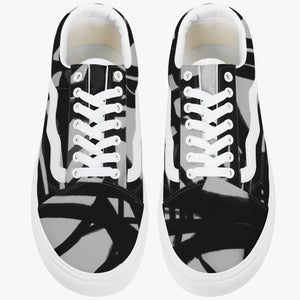 Fun designer black and white sneaker by JG. Only available at Ace Shopping Club. Unisex. Trendy canvas upper with soft lining construction.