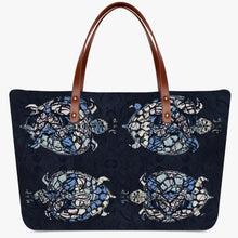 Load image into Gallery viewer, Beautiful safe the turtle designer tote for everyday use. Made of premium diving cloth fabric. Durable PU leather handles. Smooth top zipper closure. Ultra-large interior capacity for the storage of daily must-haves. Free shipping.
