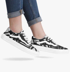 Fun designer black and white sneaker by JG. Only available at Ace Shopping Club. Unisex. Trendy canvas upper with soft lining construction.