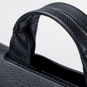Luxurious black vintage leather bag. Size: 13.18 x 8.58 x 5.23 inches (33.5cm x 21.8 x 13.3cm). Number of Handles/Straps: Single. Material: Genuine Leather. Lining Material: Nylon. Interior: Interior Compartment. Interior: Interior Slot Pocket. Hardness: Soft. Decoration: Lock. Closure Type: Zipper. Free shipping.