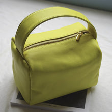 Load image into Gallery viewer, Casual designed yellow green box handbag. Material: Leather. Lining Material: Cotton. Interior: Cell Phone Pocket. Hardness: Soft. Closure Type: Hasp. Closure: zipper. Size: 12.59 x 11.02 inches (32cm x 28 cm). Free shipping.
