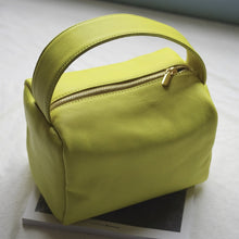 Load image into Gallery viewer, Casual designed yellow green box handbag. Material: Leather. Lining Material: Cotton. Interior: Cell Phone Pocket. Hardness: Soft. Closure Type: Hasp. Closure: zipper. Size: 12.59 x 11.02 inches (32cm x 28 cm). Free shipping.
