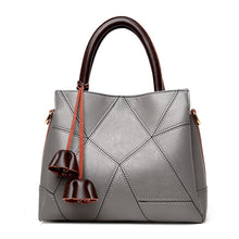 Load image into Gallery viewer, The perfect handbag for you. Number of Handles/Straps: Single. Main Material: PU. Lining Material: Polyester. Interior: Interior Slot Pocket,Cell Phone Pocket,Interior Zipper Pocket,Interior Compartment. Hardness: Hard. Exterior: Silt Pocket. Decoration: Tassel. Closure Type: Zipper. Size: 10.69&quot; x 9.44&quot; x 4.72&quot; (27cm x 24cm x 12 cm).
