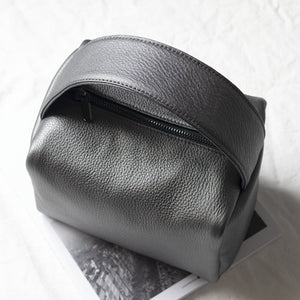 Casual designed silver box handbag. Material: Leather. Lining Material: Cotton. Interior: Cell Phone Pocket. Hardness: Soft. Closure Type: Hasp. Closure: zipper. Size: 12.59 x 11.02 inches (32cm x 28 cm). Free shipping.