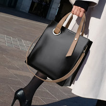 Load image into Gallery viewer, Beautiful elegant handbag Size: 10.74 x 11.41 x 5.11 inches (27.3cm x 29cm x 13cm). Number of Handles/Straps: Single. Main Material: PU. Lining Material: Polyester. Interior: Interior Slot Pocket, Interior Zipper ,Cell Phone Pocket. Hardness: Soft. Closure Type: Zipper. Free shipping.
