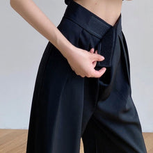 Load image into Gallery viewer, Super stylish black wide legged pants. Waist Type: High. Material: Cotton and polyester. Length: Full Length. Front Style: Flat. Fit Type: Loose. Fabric Type: Woven. Decoration: Pockets. Closure Type: Elastic Waist. Free shipping.
