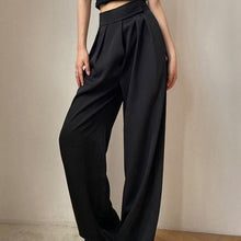 Load image into Gallery viewer, Super stylish black wide legged pants. Waist Type: High. Material: Cotton and polyester. Length: Full Length. Front Style: Flat. Fit Type: Loose. Fabric Type: Woven. Decoration: Pockets. Closure Type: Elastic Waist. Free shipping.
