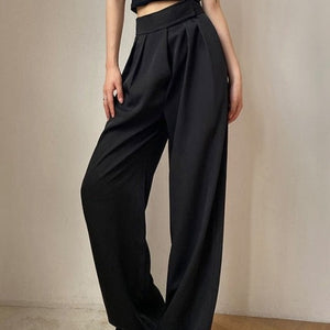 Super stylish black wide legged pants. Waist Type: High. Material: Cotton and polyester. Length: Full Length. Front Style: Flat. Fit Type: Loose. Fabric Type: Woven. Decoration: Pockets. Closure Type: Elastic Waist. Free shipping.