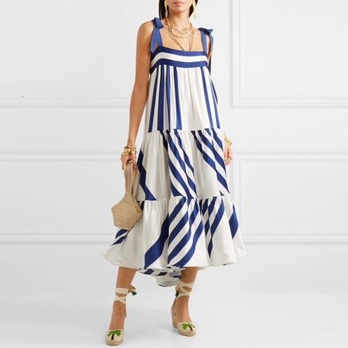Stylish spaghetti strap blue and white sundress. Silhouette: A-Line. Sleeve Style: Spaghetti Strap. Decoration: Bow. Dress Length: Mid-Calf. Material: Cotton and Polyester. Sleeve Length: Sleeveless.  Pattern Type: striped. Free shipping.