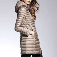 Load image into Gallery viewer, This down jacket will keep you warm this fall and winter. Type: Slim. Thickness: Standard. Style: Casual. Sleeve Length: Full. Material: nylon. Material: Down. Hooded. Filling: White duck down. Fabric Type: Broadcloth. Down Weight: &lt;100g. Down Content: 90%. Clothing Length: Long. Closure Type: zipper. Free Shipping.
