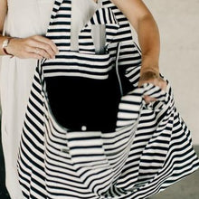 Load image into Gallery viewer, Super cool extra large black and white striped tote bag. Material: Canvas. Pattern Type: Striped. Closure Type: String. Size: 25.5&quot; x 27.5&quot; (65 x 70 cm). Free shipping. 
