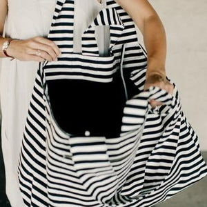 Super cool extra large black and white striped tote bag. Material: Canvas. Pattern Type: Striped. Closure Type: String. Size: 25.5" x 27.5" (65 x 70 cm). Free shipping. 