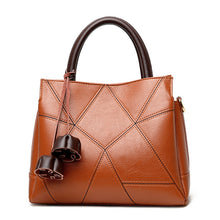 Load image into Gallery viewer, The perfect handbag for you. Number of Handles/Straps: Single. Main Material: PU. Lining Material: Polyester. Interior: Interior Slot Pocket,Cell Phone Pocket,Interior Zipper Pocket,Interior Compartment. Hardness: Hard. Exterior: Silt Pocket. Decoration: Tassel. Closure Type: Zipper. Size: 10.69&quot; x 9.44&quot; x 4.72&quot; (27cm x 24cm x 12 cm).
