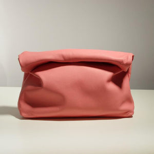 Casual designed pink clutch bag. Material: Leather. Lining Material: Cotton. Interior: Cell Phone Pocket. Hardness: Soft. Closure Type: Hasp. Closure: zipper. Size: 12.59 x 11.02 inches (32cm x 28 cm). Free shipping.