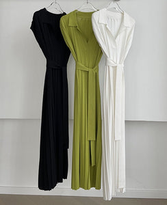 Turn-down collar dress in white, black, and green. Waistline: Loose waist. Sleeve Style: Regular. Silhouette: Straight. Neckline: Turn-down Collar. Material Composition: Natural Fiber. Material: Acrylic and Cotton. Fabric Type: Knitting. Dress Length: Mid-Calf. Decoration: Belt. Closure Type: Pullover. Free Shipping.