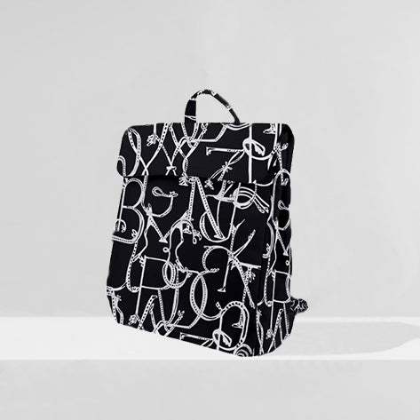 This Flap Top Designer Backpack from the JG Signature Collection comes with extra compartments in the back and on the inside for better organization. 