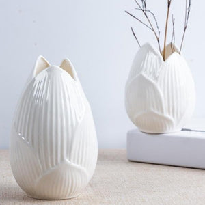This beautiful handmade ceramic vase makes a great gift for yourself or a friend. Style: Modern. Material: ceramic.Features: Easy to clean, corrosion resistant, and sturdy. Free shipping. 