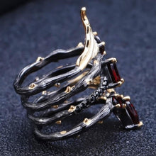 Load image into Gallery viewer, Beautifully handmade silver ring for you or that special friend or family member. Metals Type: Silver. Metal Stamp: 925 Sterling. Main Stone: Garnet. Setting Type: Prong Setting. Main Stone Size: 5x 7mm / 4 x 6mm / 3 x 5mm. Side Stone: Cubic Zirconia. Silver Weight: 7.84g. Free shipping. 
