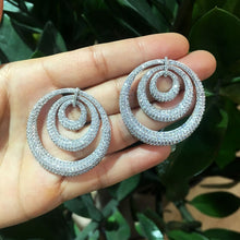 Load image into Gallery viewer, Sweet circle earrings to wear to your next party. Material: Cubic zirconia. Metals type: Copper. Earring type: Drop earrings. Free shipping. 
