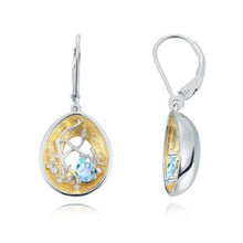 Load image into Gallery viewer, Beautiful artisan made light blue topaz, silver and gold earrings as a gift for you or a loved one. Main Stone: Topaz. Metals Type: 925 Sterling Silver and Gold Plated. Earring Type: Drop Earrings.
