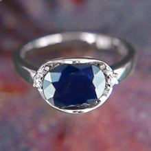Load image into Gallery viewer, Beautiful Blue Sapphire 925 sterling silver oval ring. Great gift for the one you love. Metal: Silver. Metal Stamp: 925 Sterling. Main Stone: Blue Sapphire. Side Stone: White Cubic Zirconia. 
