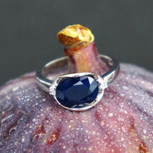 Load image into Gallery viewer, Beautiful Blue Sapphire 925 sterling silver oval ring. Great gift for the one you love. Metal: Silver. Metal Stamp: 925 Sterling. Main Stone: Blue Sapphire. Side Stone: White Cubic Zirconia. Setting Type: Prong Setting. Shape: Oval. Main Stone Size: 0.31 x 0.39 inches (8 x 10mm). Free shipping. 
