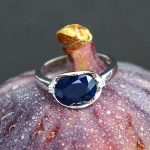 Beautiful Blue Sapphire 925 sterling silver oval ring. Great gift for the one you love. Metal: Silver. Metal Stamp: 925 Sterling. Main Stone: Blue Sapphire. Side Stone: White Cubic Zirconia. Setting Type: Prong Setting. Shape: Oval. Main Stone Size: 0.31 x 0.39 inches (8 x 10mm). Free shipping. 