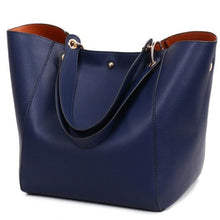 Load image into Gallery viewer, This beautiful large large capacity blue leather tote bag is perfect for everyday use. Closure Type: Hasp. Hardness: Soft. Lining Material: Synthetic Leather. Number of Handles/Straps: Two. Interior: Interior Compartment, Zipper Pocket, Slot Pocket, Cell Phone Pocket. Size: 11.81 x 1.97 x 7.87 inches (0cm x 5cm x 20cm). Free shipping. 
