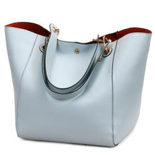 Load image into Gallery viewer, This beautiful large large capacity light blue leather handbag is perfect for everyday use. Closure Type: Hasp. Hardness: Soft. Lining Material: Synthetic Leather. Number of Handles/Straps: Two. Interior: Interior Compartment, Zipper Pocket, Slot Pocket, Cell Phone Pocket. Size: 11.81 x 1.97 x 7.87 inches (0cm x 5cm x 20cm). Free shipping.
