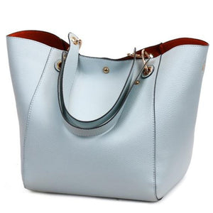 This beautiful large large capacity light blue leather handbag is perfect for everyday use. Closure Type: Hasp. Hardness: Soft. Lining Material: Synthetic Leather. Number of Handles/Straps: Two. Interior: Interior Compartment, Zipper Pocket, Slot Pocket, Cell Phone Pocket. Size: 11.81 x 1.97 x 7.87 inches (0cm x 5cm x 20cm). Free shipping.