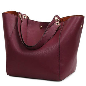 This beautiful large large capacity dark red leather handbag is perfect for everyday use. Closure Type: Hasp. Hardness: Soft. Lining Material: Synthetic Leather. Number of Handles/Straps: Two. Interior: Interior Compartment, Zipper Pocket, Slot Pocket, Cell Phone Pocket. Size: 11.81 x 1.97 x 7.87 inches (0cm x 5cm x 20cm). Free shipping.