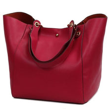 Load image into Gallery viewer, This beautiful large large capacity red leather handbag is perfect for everyday use. Closure Type: Hasp. Hardness: Soft. Lining Material: Synthetic Leather. Number of Handles/Straps: Two. Interior: Interior Compartment, Zipper Pocket, Slot Pocket, Cell Phone Pocket. Size: 11.81 x 1.97 x 7.87 inches (0cm x 5cm x 20cm). Free shipping.
