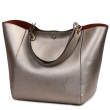 Load image into Gallery viewer, This beautiful large large capacity bronze leather  tote bag is perfect for everyday use. Closure Type: Hasp. Hardness: Soft. Lining Material: Synthetic Leather. Number of Handles/Straps: Two. Interior: Interior Compartment, Zipper Pocket, Slot Pocket, Cell Phone Pocket. Size: 11.81 x 1.97 x 7.87 inches (0cm x 5cm x 20cm). Free shipping. 
