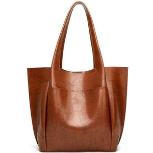 Large capacity designer shoulder bag for you to take anywhere you go. Perfect for work. The leather shoulder bag even has a cell phone pocket. Main Material: PU Leather. Closure Type: Hasp. Bag size: 12.9" H x 11.8" W x 4.72"D  (33 cm H x 30 cm D x 12 cm D). Strap size: 12.9 inches H (33cm H). Free shipping. 