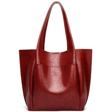 Load image into Gallery viewer, Large capacity red designer shoulder bag for you to take anywhere you go. Perfect for work. The leather shoulder bag even has a cell phone pocket. Main Material: PU Leather. Closure Type: Hasp. Bag size: 12.9&quot; H x 11.8&quot; W x 4.72&quot;D  (33 cm H x 30 cm D x 12 cm D). Strap size: 12.9 inches H (33cm H). Free shipping. 
