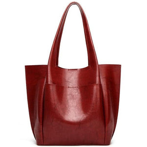 Large capacity red designer shoulder bag for you to take anywhere you go. Perfect for work. The leather shoulder bag even has a cell phone pocket. Main Material: PU Leather. Closure Type: Hasp. Bag size: 12.9" H x 11.8" W x 4.72"D  (33 cm H x 30 cm D x 12 cm D). Strap size: 12.9 inches H (33cm H). Free shipping. 