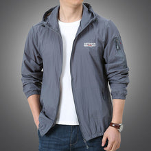 Load image into Gallery viewer, Super light windbreaker jacket in blue, teal, black or grey. Material: Nylon and Polyester. Closure Type: zipper. Sleeve. Style: Regular. Thickness: Thin. Hooded: Yes. Type: Wide-waisted. Clothing Length: Regular. Decoration: Pockets. Collar: Turn-down Collar. Free shipping. 
