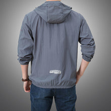 Load image into Gallery viewer, Super light windbreaker jacket in blue, teal, black or grey. Material: Nylon and Polyester. Closure Type: zipper. Sleeve. Style: Regular. Thickness: Thin. Hooded: Yes. Type: Wide-waisted. Clothing Length: Regular. Decoration: Pockets. Collar: Turn-down Collar. Free shipping. 
