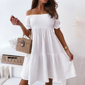 Stylish white summer dress. This sweet beach or party dress comes in white, black, khaki and green. Silhouette: A-Line. Sleeve Style: Puff Sleeve. Decoration: Shirring. Dress Length: Above Knee, Mini. 