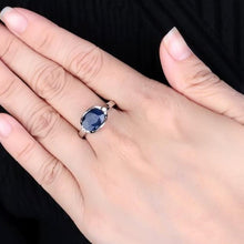 Load image into Gallery viewer, Beautiful Blue Sapphire 925 sterling silver oval ring. Great gift for the one you love. Metal: Silver. Metal Stamp: 925 Sterling. Main Stone: Blue Sapphire. Side Stone: White Cubic Zirconia. Setting Type: Prong Setting. 
