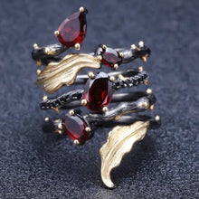 Load image into Gallery viewer, Beautifully handmade silver ring for you or that special friend or family member. Metals Type: Silver. Metal Stamp: 925 Sterling. Main Stone: Garnet. Setting Type: Prong Setting. Main Stone Size: 5x 7mm / 4 x 6mm / 3 x 5mm. Side Stone: Cubic Zirconia. Silver Weight: 7.84g. Free shipping. 
